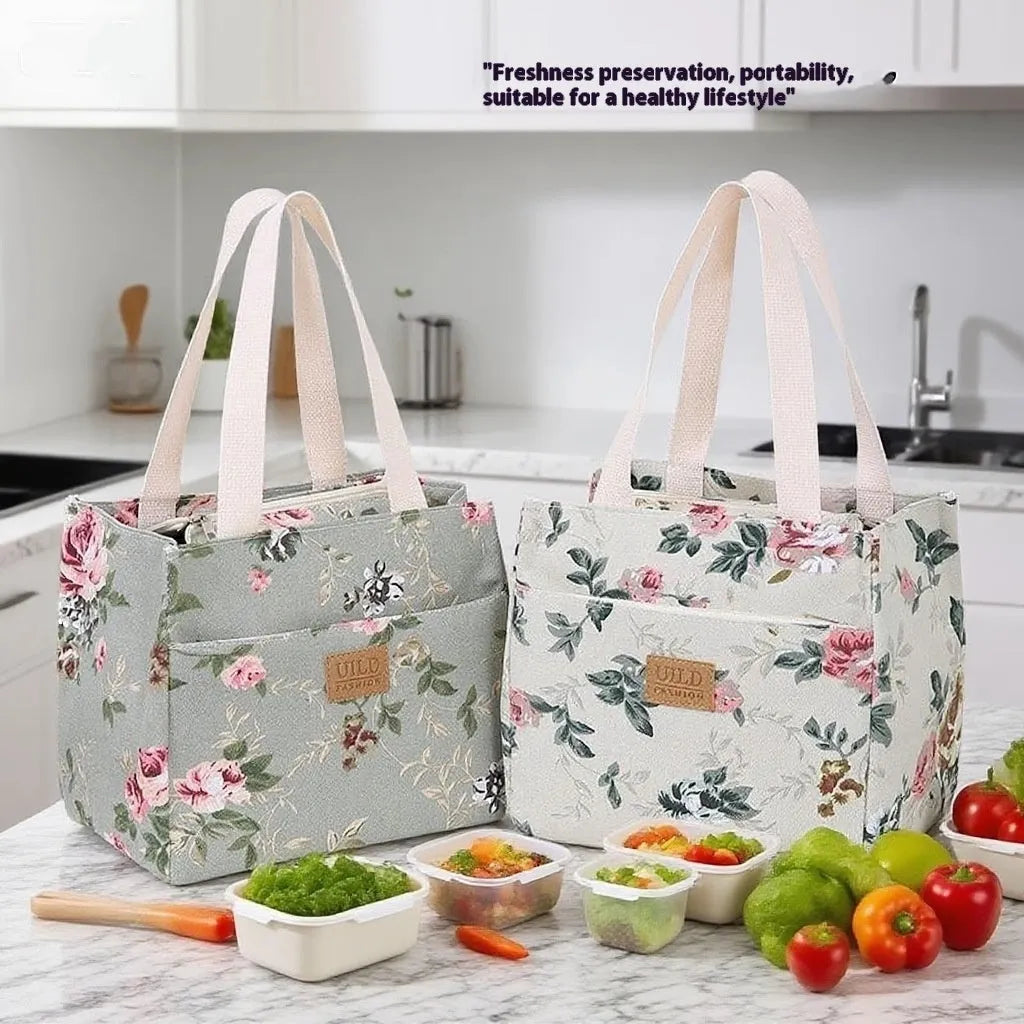 Women's printed canvas handbag with aluminium frame in floral and cat design options