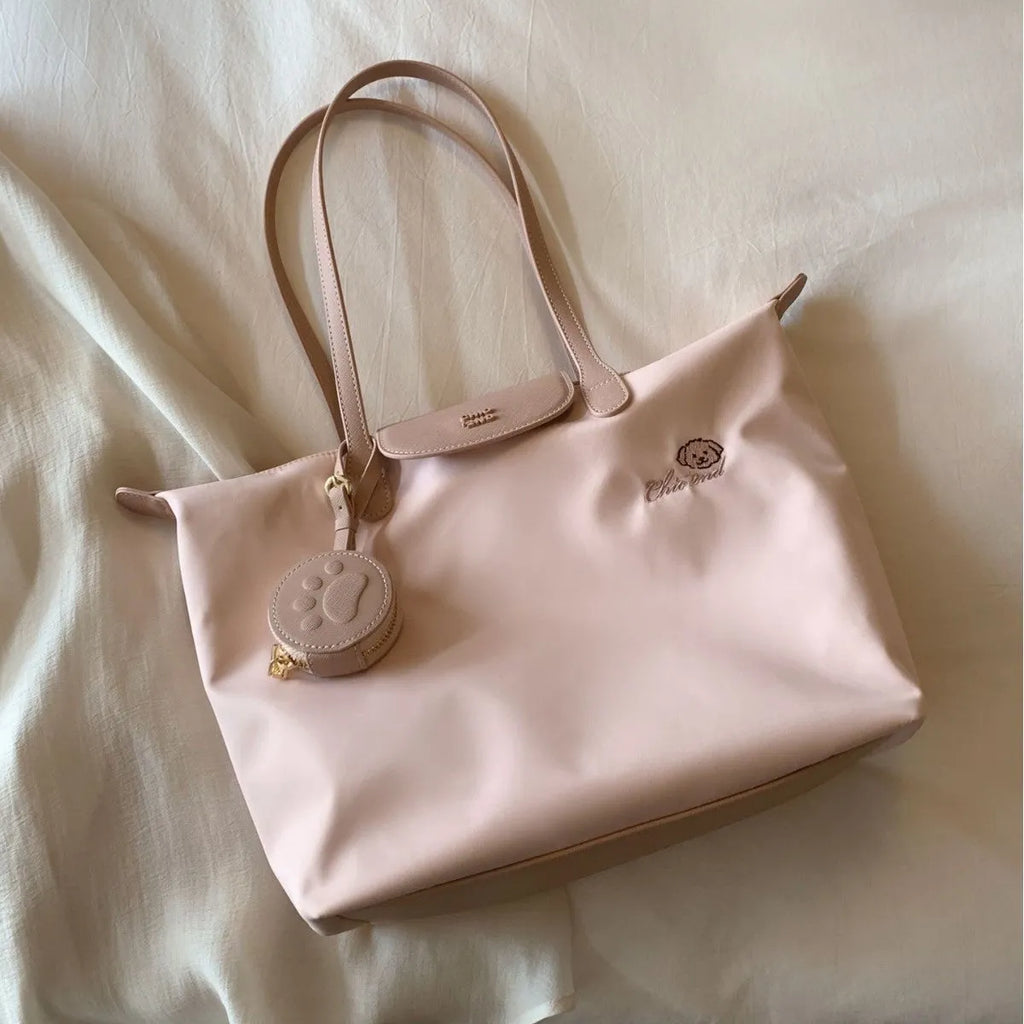 Oxford cloth tote shoulder bag in pink or milky white with mobile phone compartment and horizontal square shape
