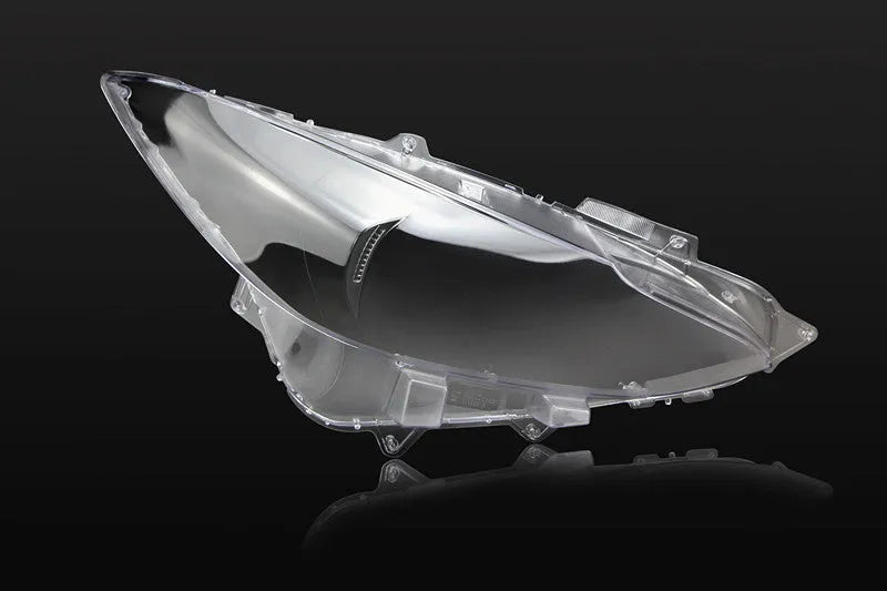Mazda 3 Exela model headlamp replacement cover with snake glue adhesive.