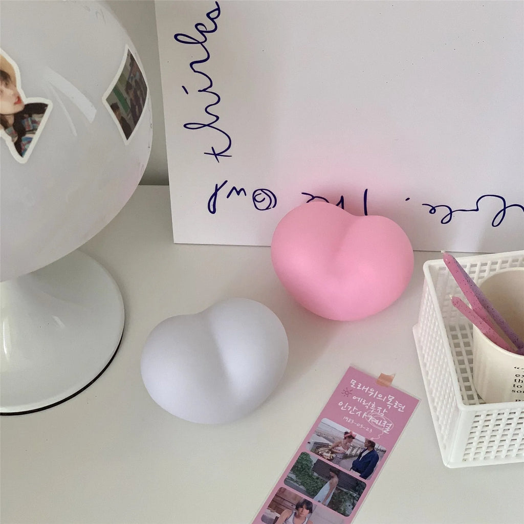 Vinyl atmosphere lamp in white and pink colours showing small and large size options