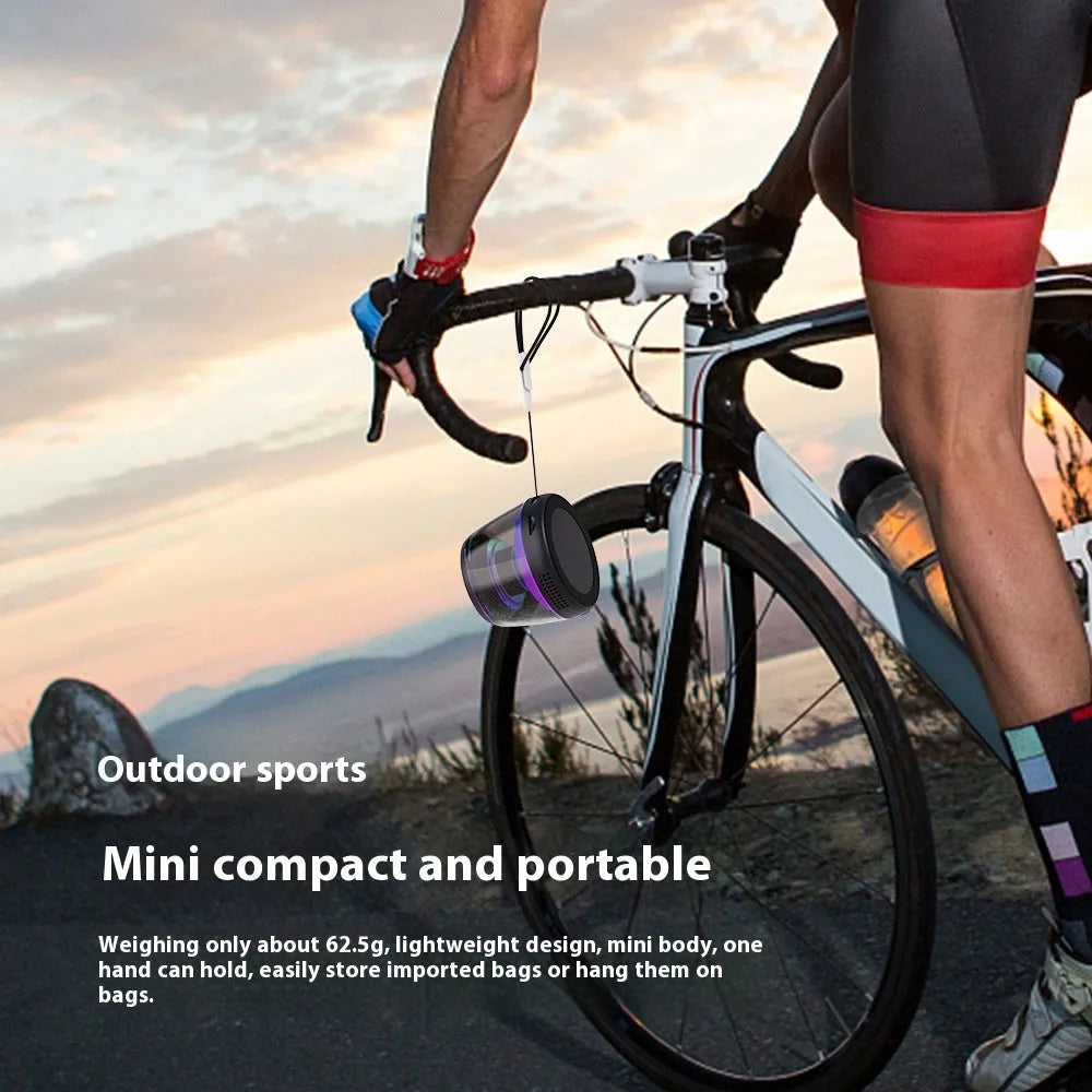 Portable wireless Bluetooth speaker with magnetic mount and ambient lighting in black or white