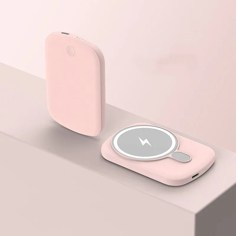 Magsafe magnetic power bank for iPhone wireless charging in black, pink, white, or purple.