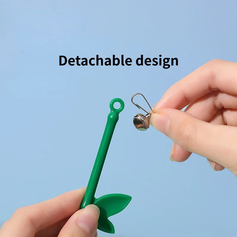 Green interactive cat feather wand toy with bell and feather attachments for indoor play