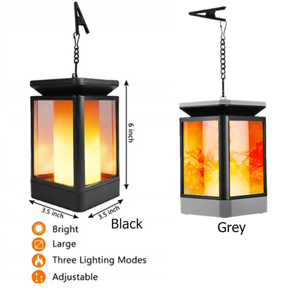 Antique-style grey solar-powered garden street lamp with LED lights in a daytime setting.