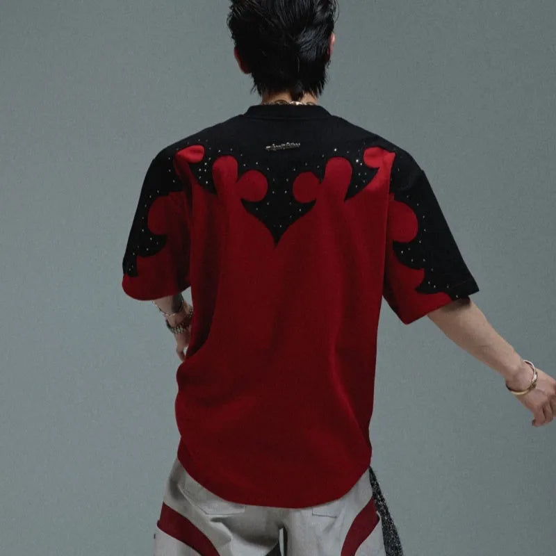 Men's loose grey cotton T-shirt with 3D stitching and rhinestone flower design on the front.