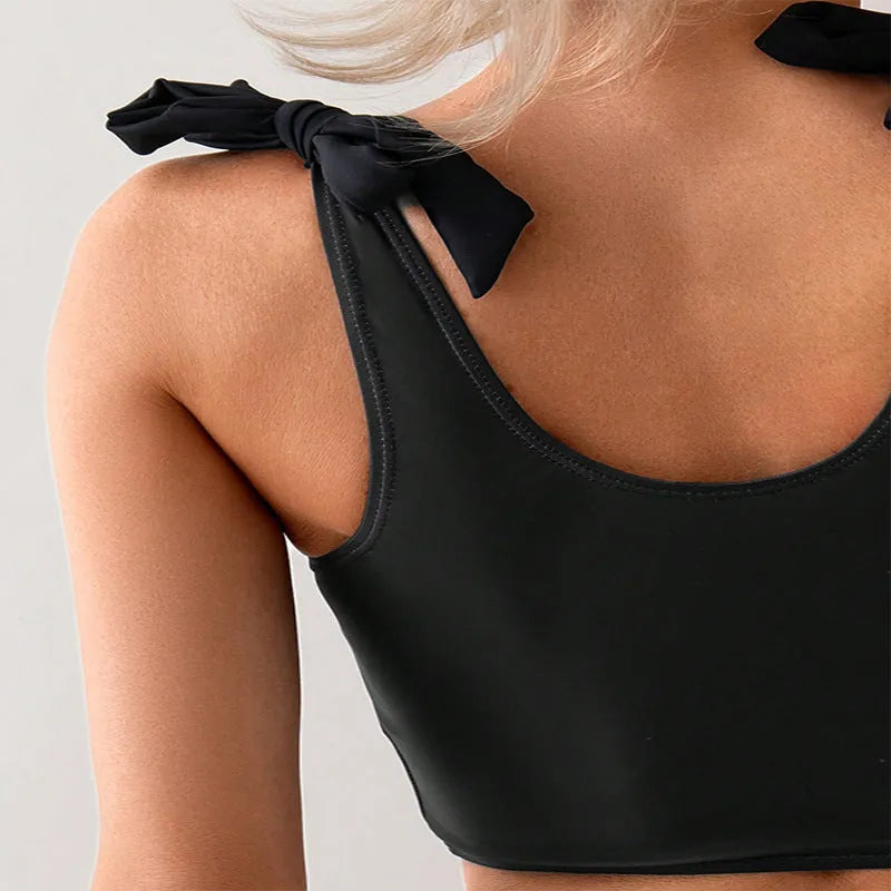 Women's coconut print bikini swimsuit with lace-up back detail showing top and pants components