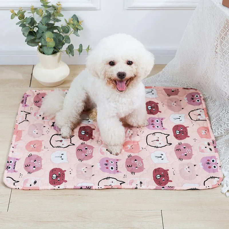 Reusable washable pet urine pad with non-slip backing in Animal World pattern, laid flat on floor.