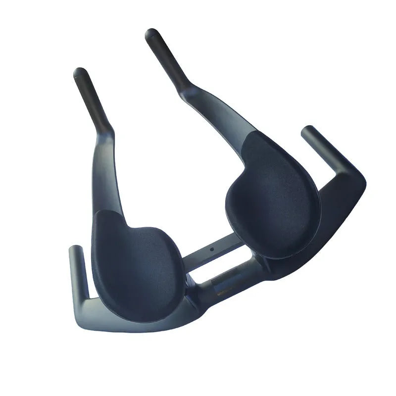 Black carbon fibre bicycle time trial handlebar showing aero profile and 31.8mm clamp area.
