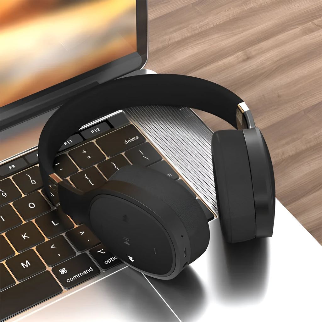 Folding wireless Bluetooth sports headset in black, shown with earcups folded for compact storage.