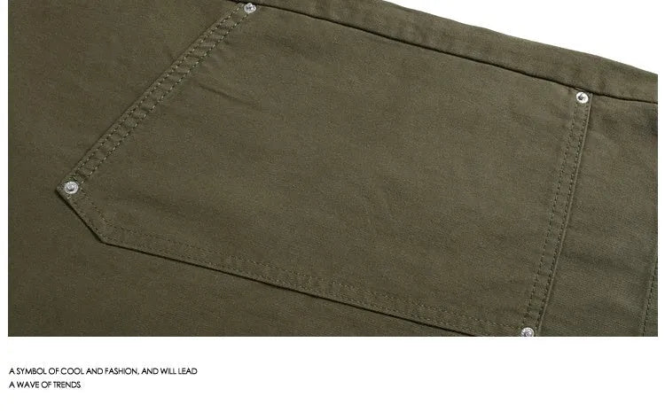 Women's workwear-inspired cropped pants with wide legs and decorative rivet detailing