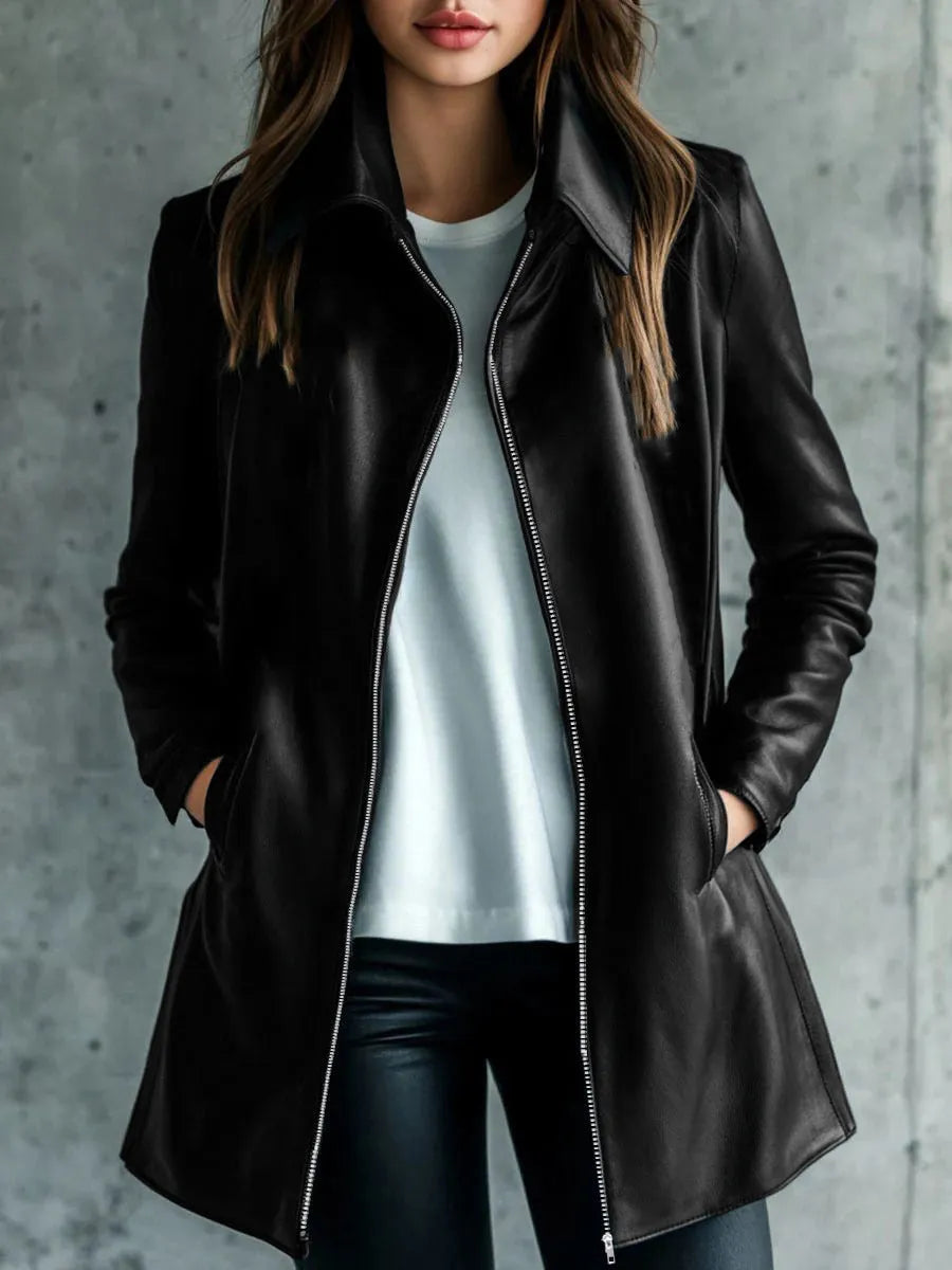 Black women's polyester leather jacket on a hanger, showing medium length and long sleeves.