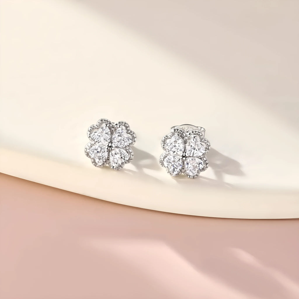 Zeng Yin heart-shaped silver earrings with zircon detail in white gold colour