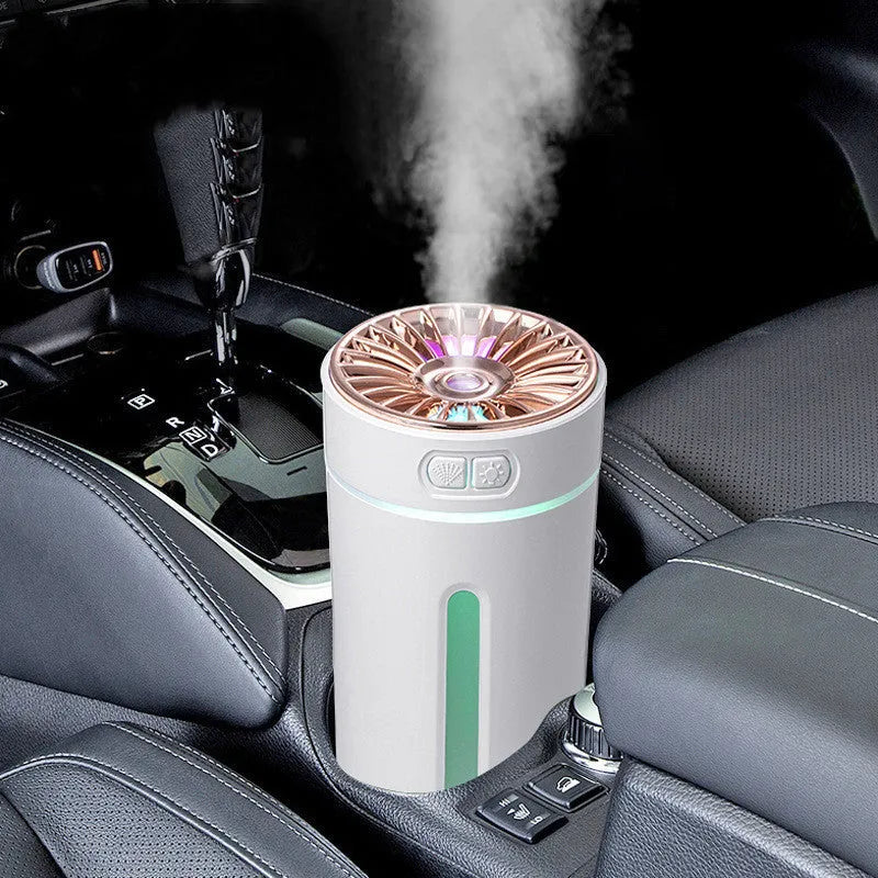 Black wireless USB humidifier with colourful lights on a car dashboard cup holder