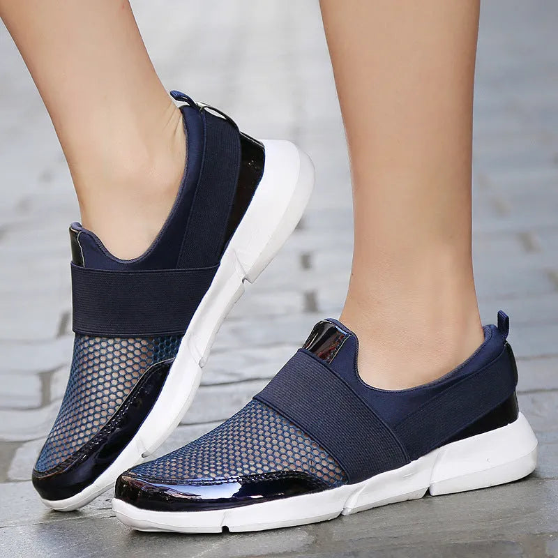 Women's blue lightweight mesh sneakers with low-top design and colour-matching pattern