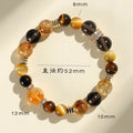 Yellow tower crystal bead bracelet with natural style on a wrist.