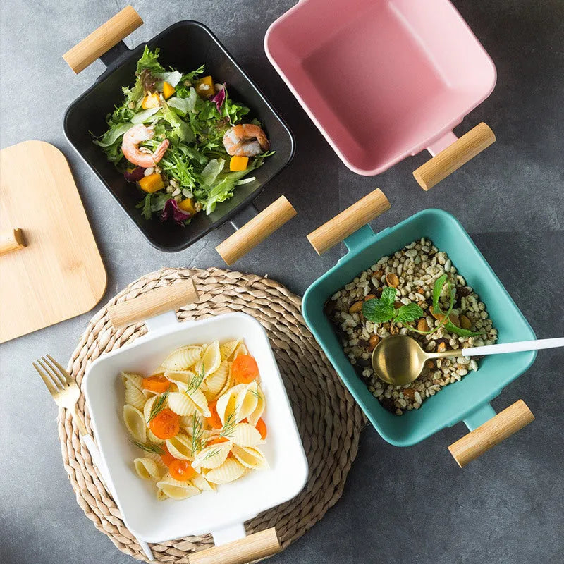 Irregular shaped ceramic bowl with matching lid in porcelain, shown in available colour options