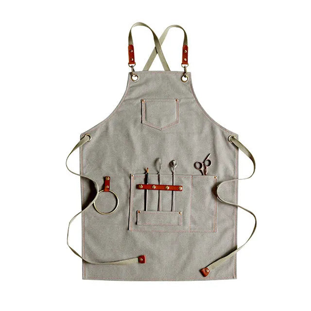 Canvas cross-strap apron in camel colour for cafe or baking work