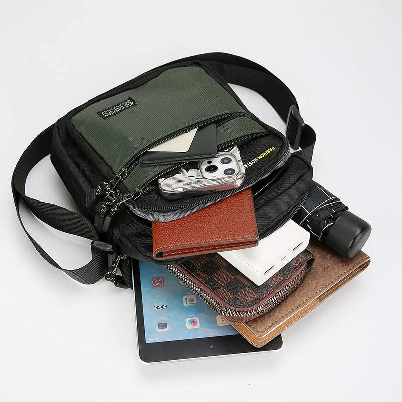Men's nylon crossbody bag in green colour with multiple compartments and adjustable strap.