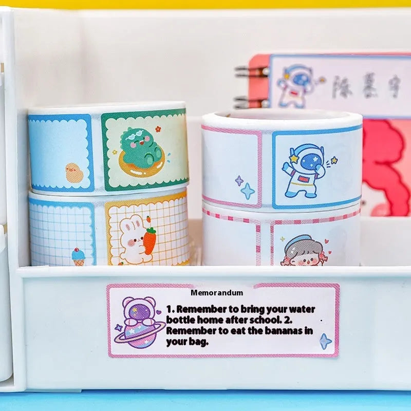 Roll of cartoon tape name stickers with dinosaur astronaut rabbit girl print designs for organisation
