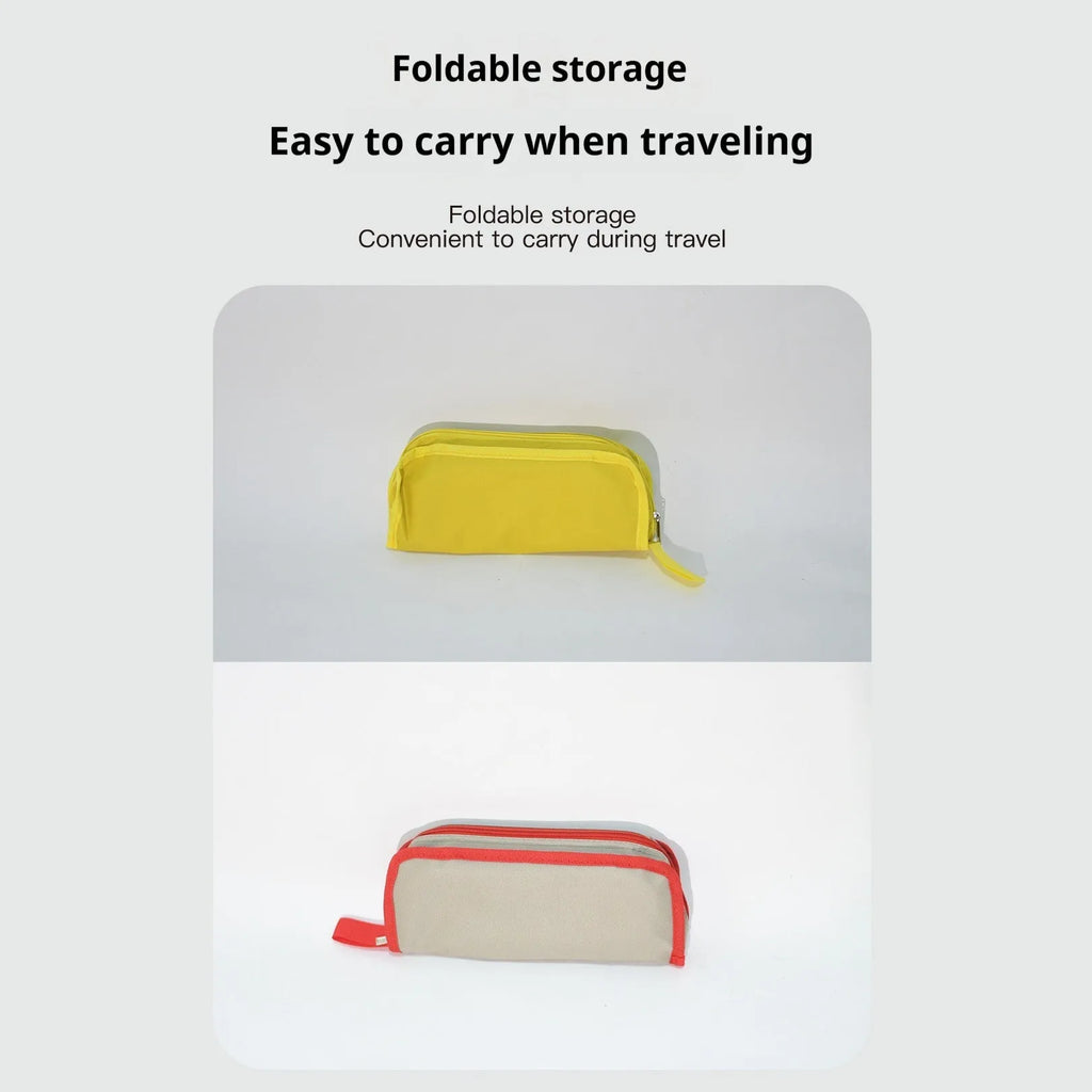 Foldable outdoor camp stool in Oxford cloth, shown in khaki colour, collapsed into its compact pencil box design.