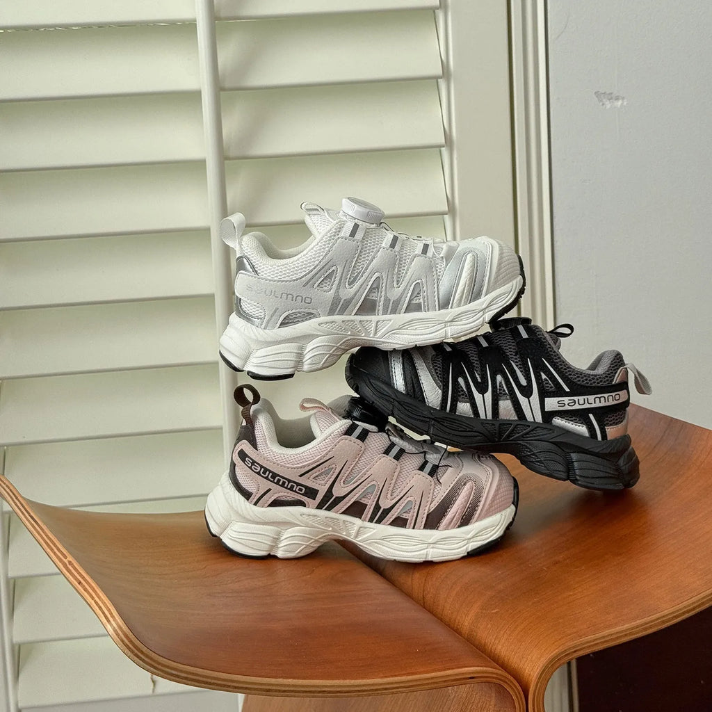 Pair of lightweight casual shoes with a solid-colour breathable mesh upper, shown in beige.