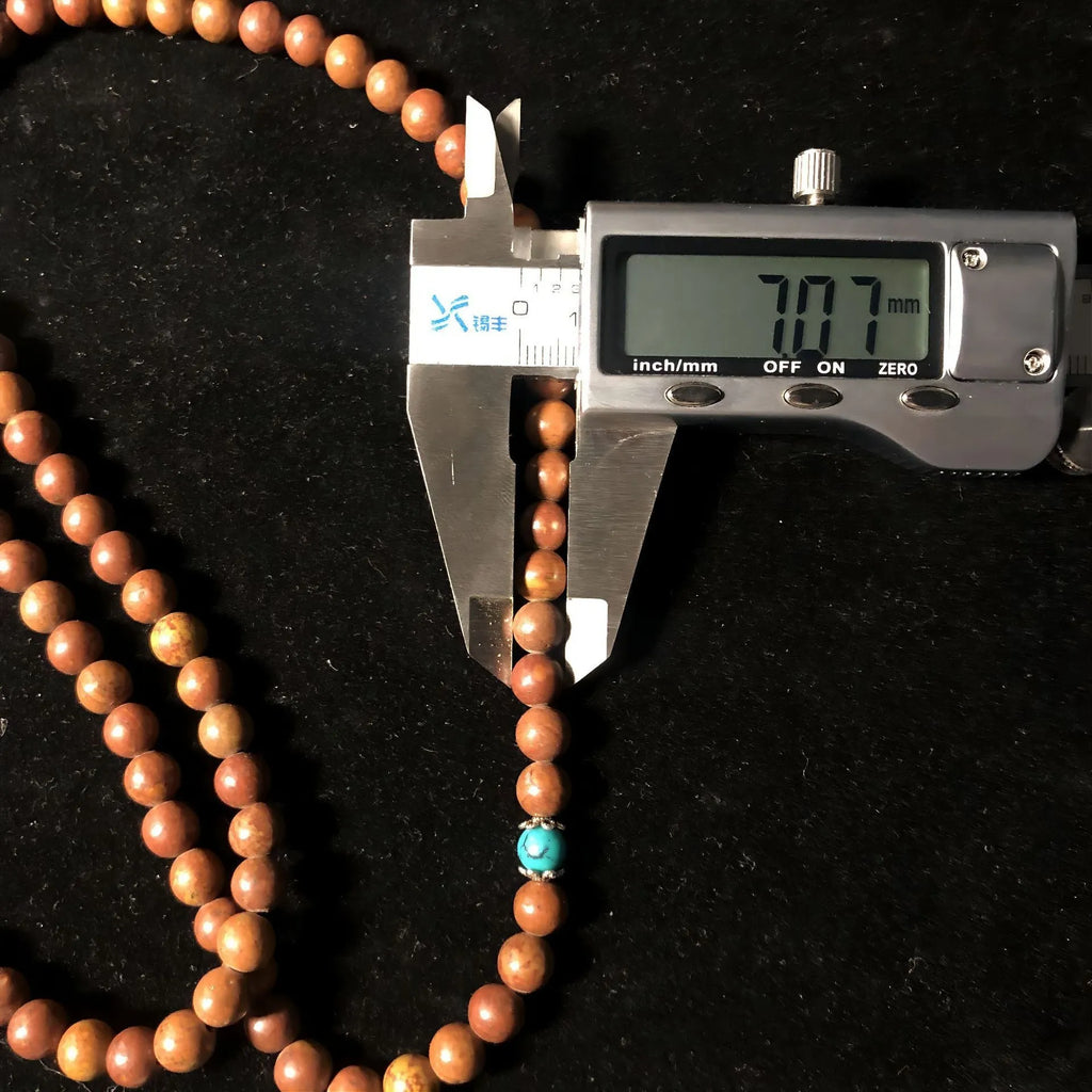 108 Lvzhu stone bead bracelet with geometric design and hand-polished 5-6mm beads