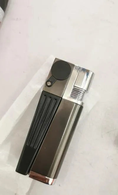 Metal folding pipe lighter with stash compartment in silver finish, showing open and closed positions