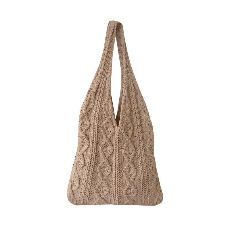 Retro hollow-knitted women's shoulder tote bag in a solid colour, showing double straps and textured fabric.