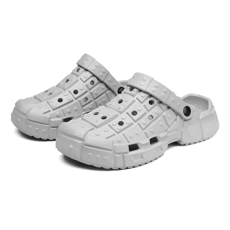 Sand-coloured men's EVA hole shoes with thick sole and toe holder design on a white background.