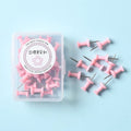 Box of macaron colour plastic push pins showing large and small sizes in cherry blossom pink, mint green, and lavender.