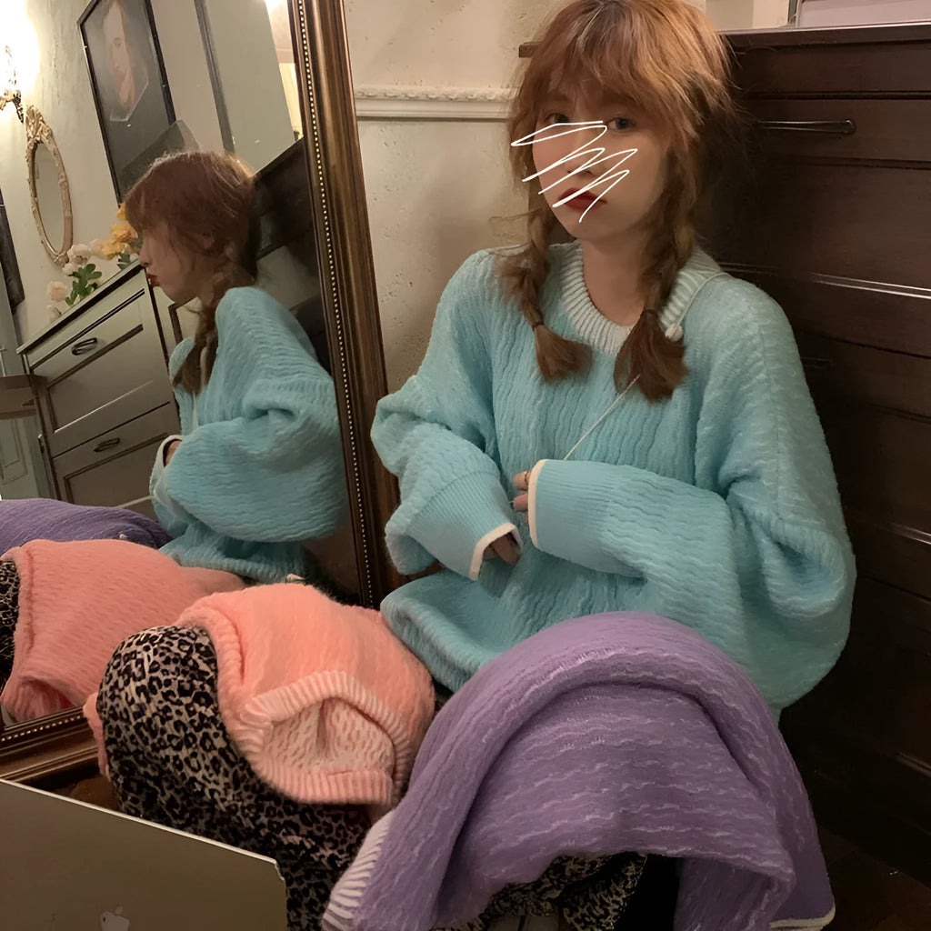Women's loose pullover sweater in solid lake blue colour with retro styling and regular sleeves