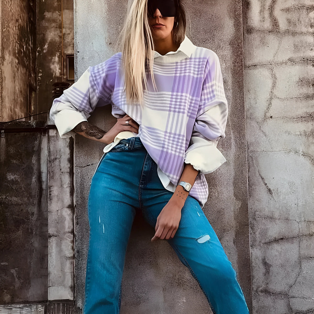 Lilac plaid print loose sweater with ribbed trim at neckline and cuffs on hanger