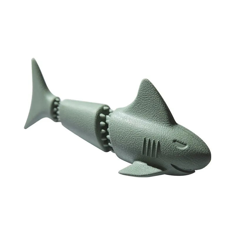 Blue deep sea shark-shaped rubber dog chew toy on a white background.