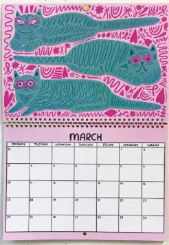 A4 cat wall calendar showing a monthly page with a cat photograph and date grid