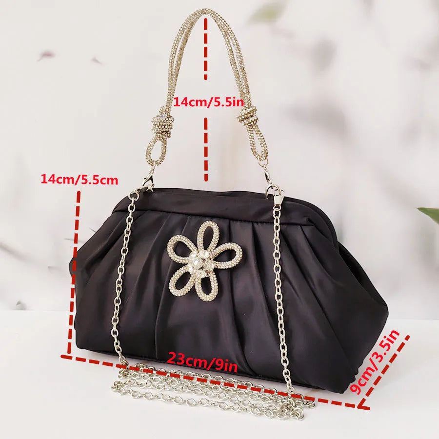 Women's soft polyester messenger bag with diamond quilting and chain strap in black colour