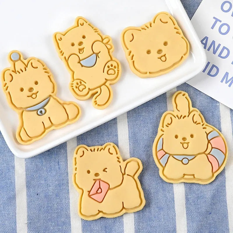 Three dimensional plastic biscuit mould showing puppy cartoon design impressions