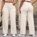Women's apricot wide leg straight jeans with high waist on a hanger