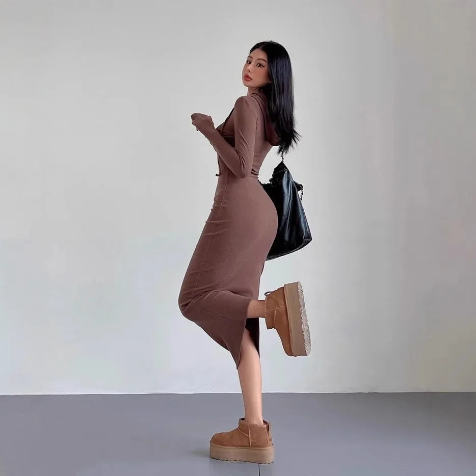 Women's long sleeve hooded sheath dress in polyester fabric showing high waist design