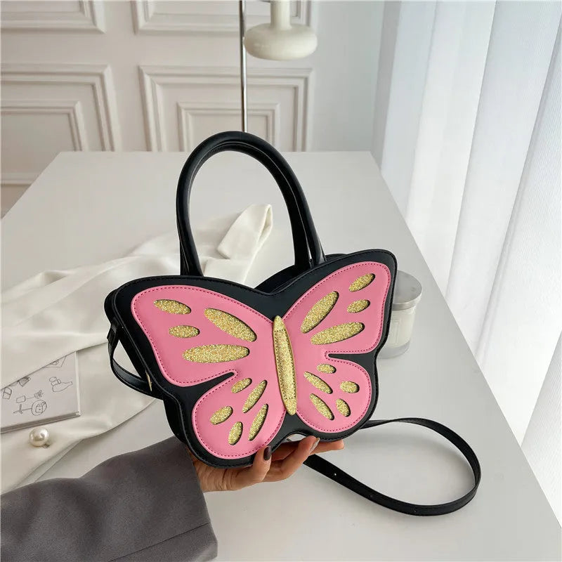 Small square crossbody bag in PU material showing contrast colour detailing and adjustable strap
