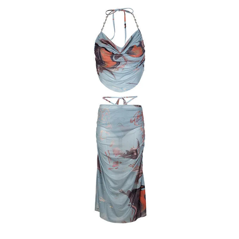 Blue three-piece women's bikini set with diamond chain design, briefs style bottoms, and backless swimwear construction