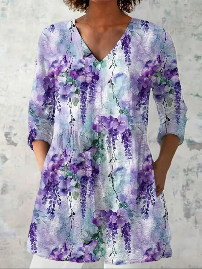 Women's slim fit long-sleeved top with retro digital print design in a colour selection.