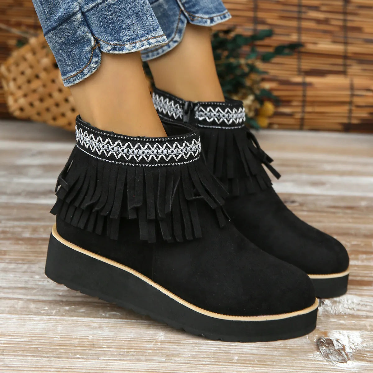 Women's dark brown suede wedge ankle boots with side zip, waterproof platform, and tassel detail.