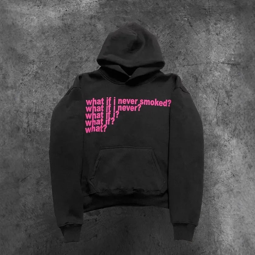 Black hooded sweater with white letter print on front, model wearing size M.