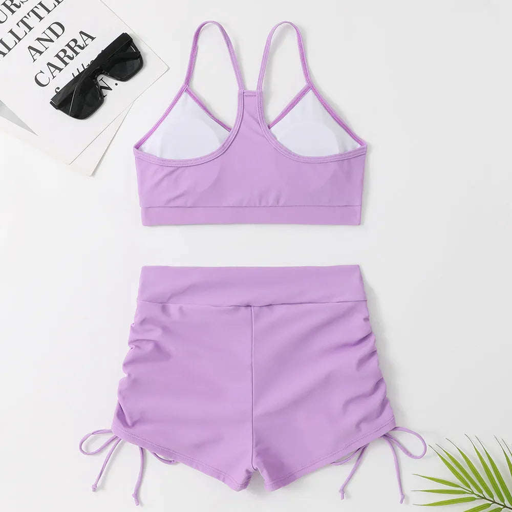 Women's purple high-waist split swimsuit with sleeveless design for swimming and surfing