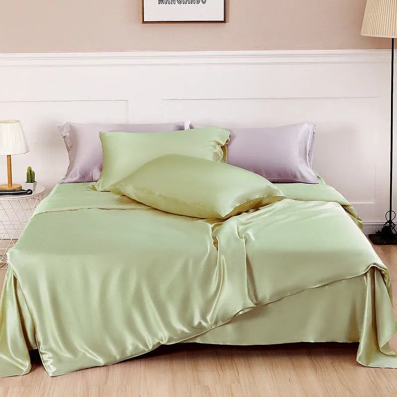 Solid colour double-sided silk duvet cover shown in bright brown, with other colour options available.