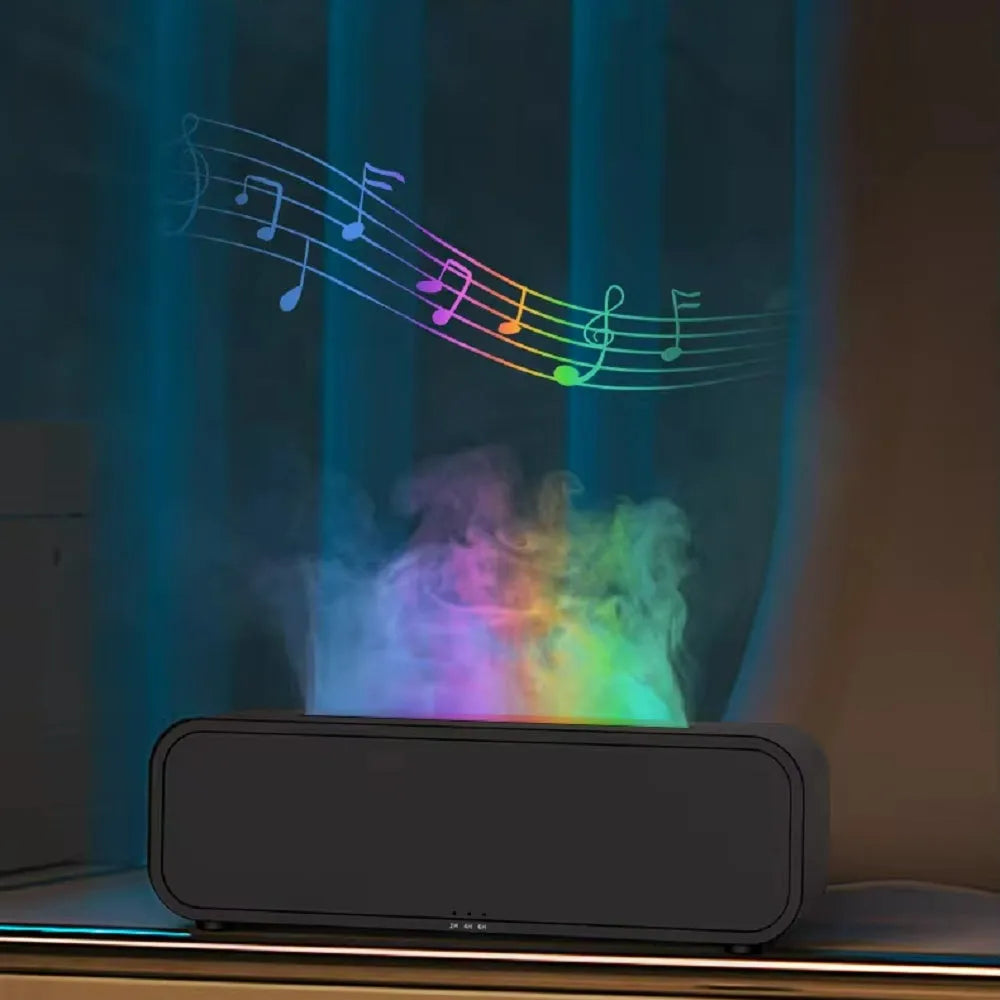Black cylindrical aroma diffuser with colour-changing LED lights and remote control