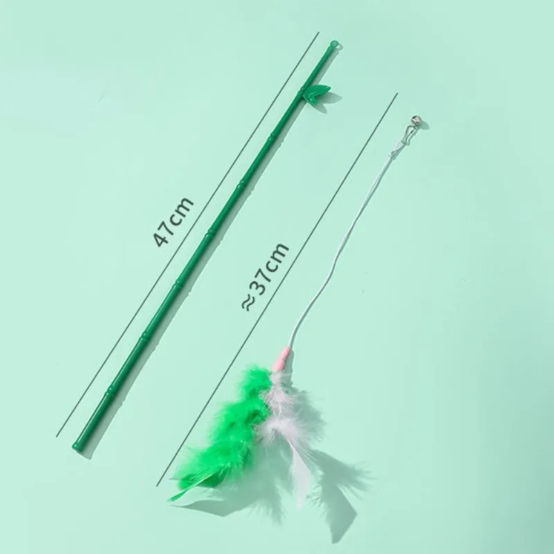 Green interactive cat feather wand toy with bell and feather attachments for indoor play