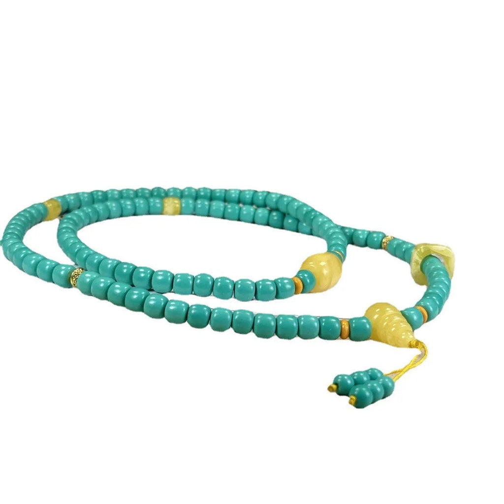 Turquoise stone mesh flower lucky pendant necklace on a ball bead chain, adjustable length.