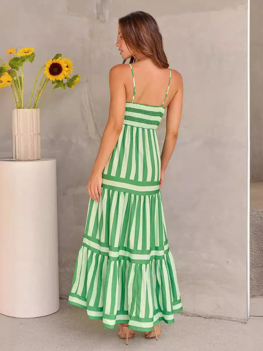 Women's striped summer dress with suspender straps, square neckline, side pockets and backless design