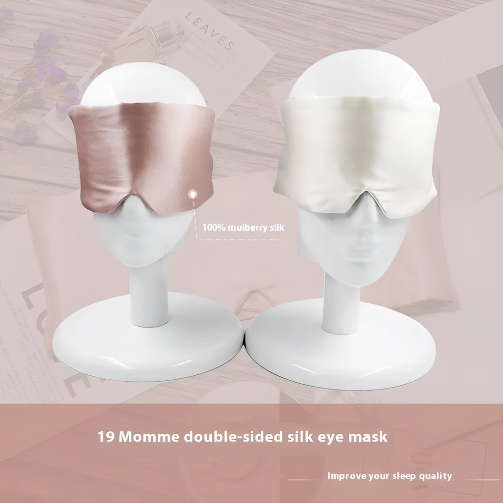 Mulberry silk sleep eye mask shown in one of seven colour options including champagne gold, navy blue, or black.